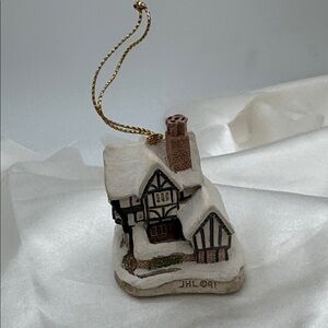 Mr Fezziwig’s Emporium” David Winter Cottage’s Christmas Ornament.